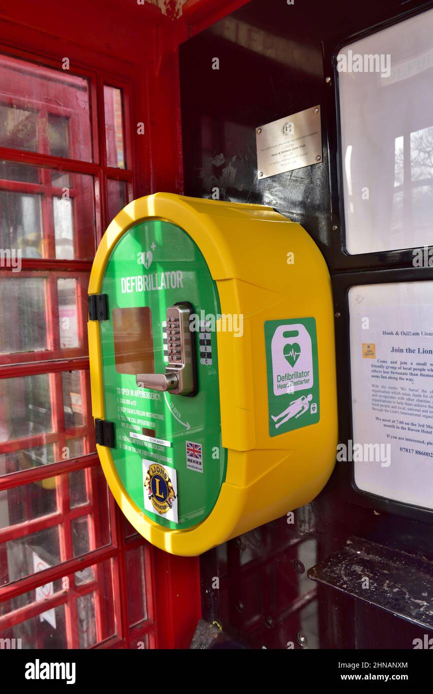Defibrillator inside repurposed red traditional telephone box, Hartley