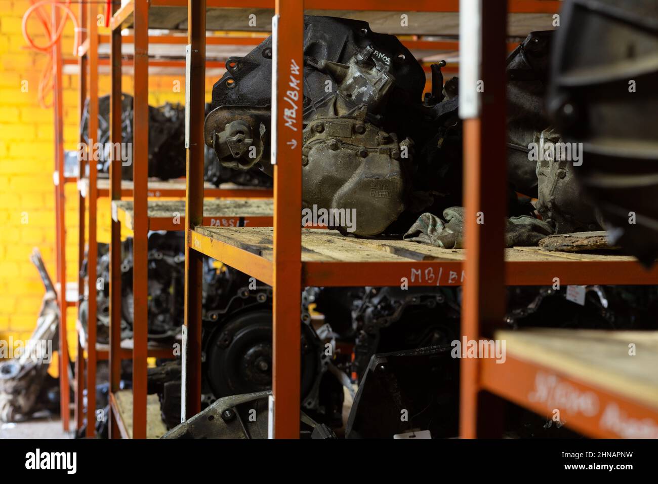 Used car parts on the store shelf. Used auto parts for sale in a store