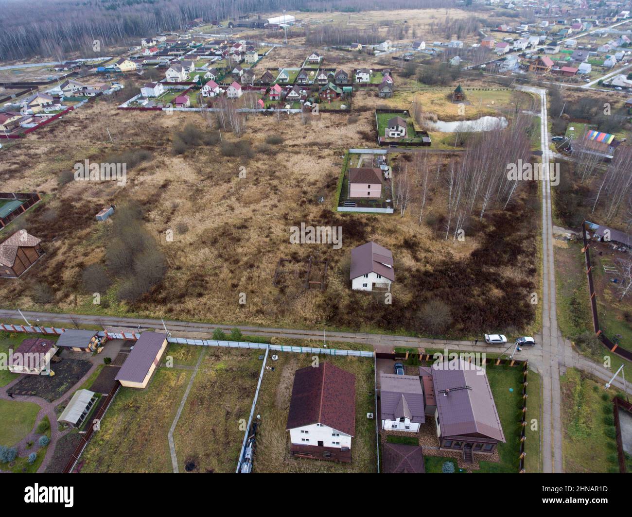 Aerial view of Russian gardeners non-commercial partnership with small houses and free lots of land, view from above Stock Photo