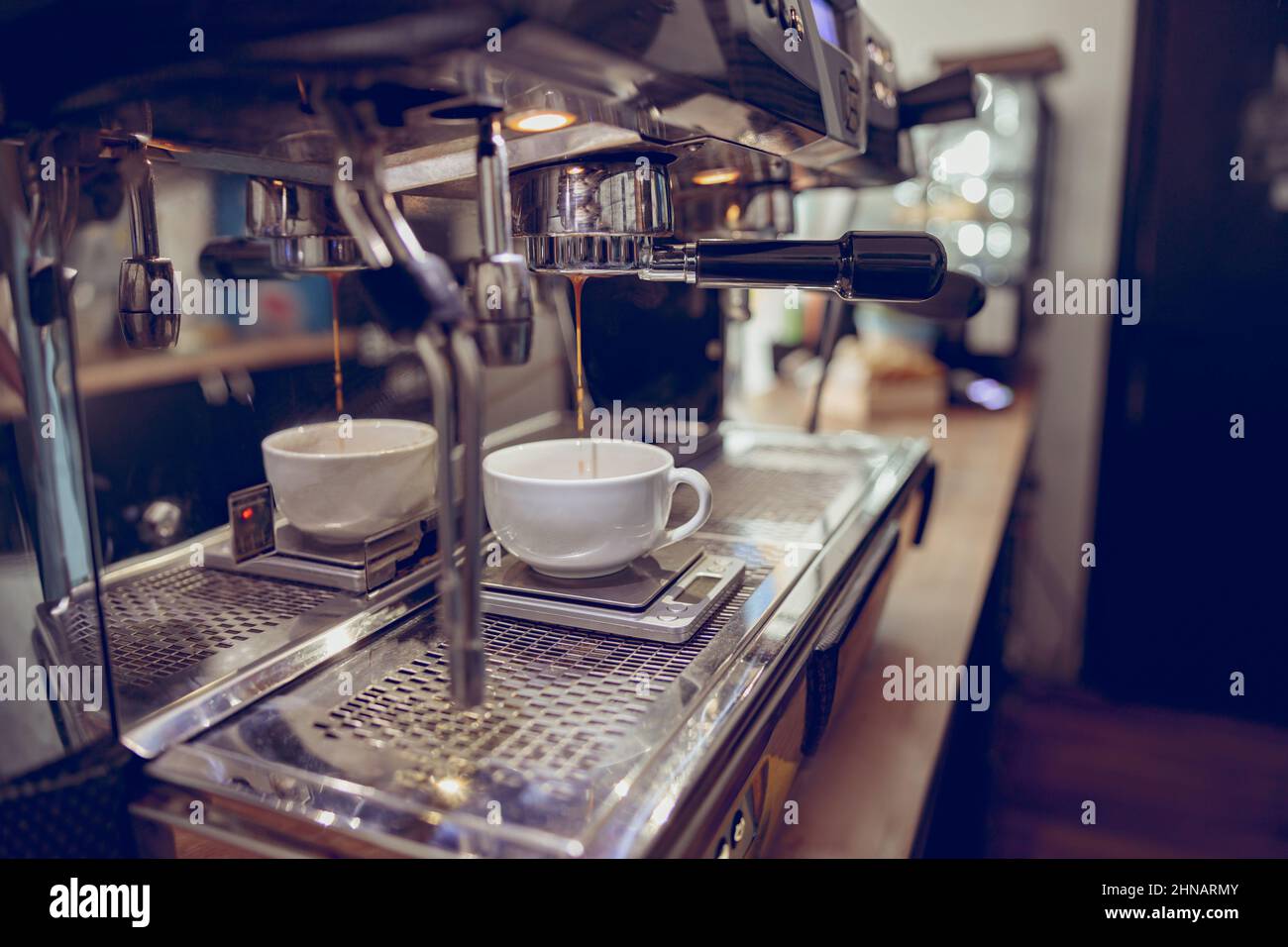 Modern coffee machine brewing espresso in cafeteria Stock Photo Alamy