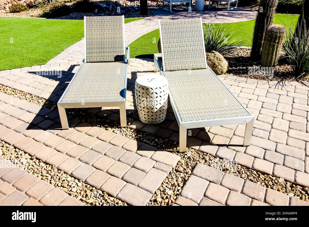 Two Reclining Lounge Chairs In Pavers Rear Yard Stock Photo Alamy