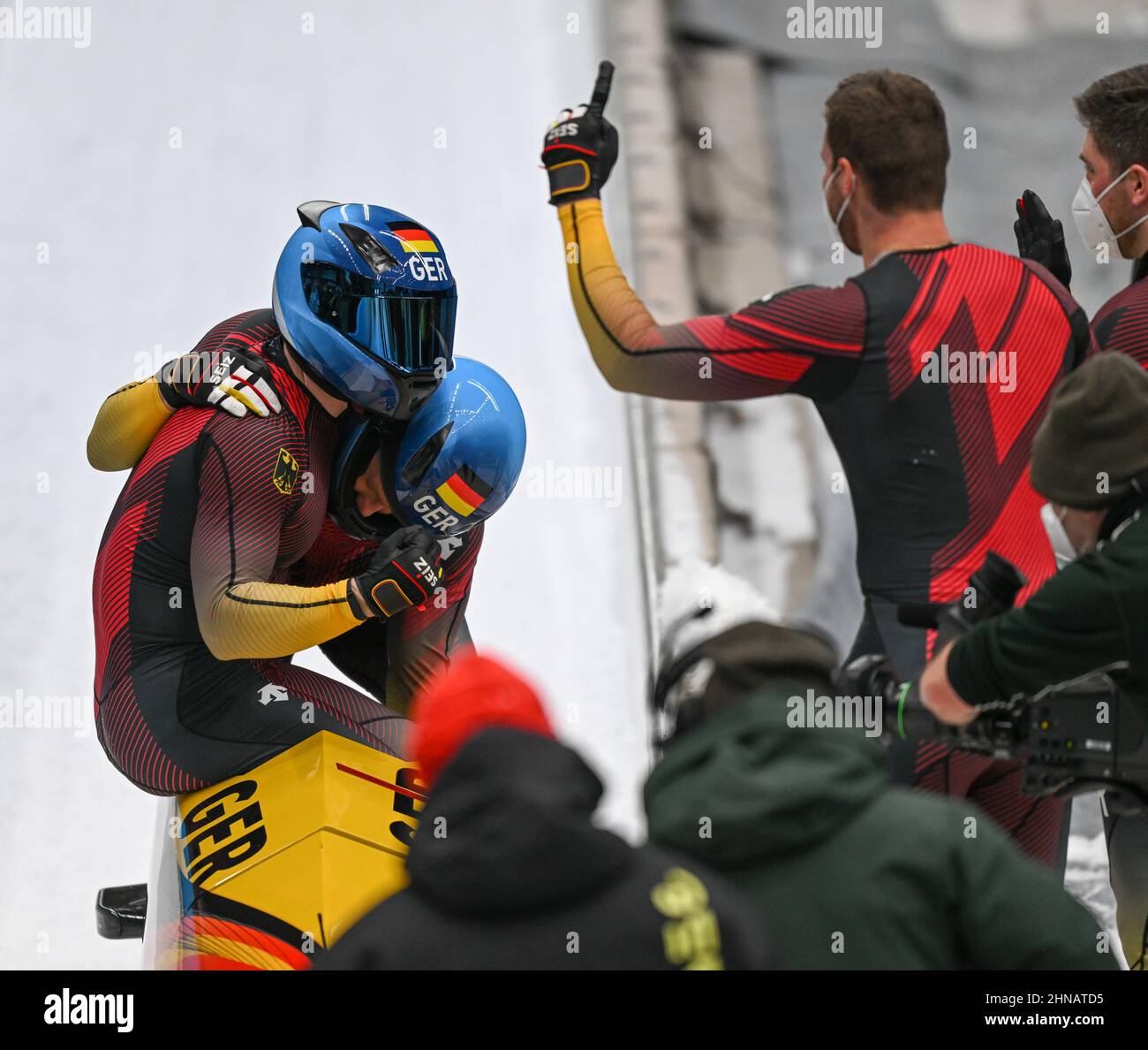 Beijing, China. 15th Feb, 2022. Francesco Friedrich/Thorsten Margis (L) of Germany celebrate after the bobsleigh 2-man heat of Beijing 2022 Winter Olympics at National Sliding Centre in Yanqing District, Beijing, capital of China, Feb. 15, 2022. Credit: Sun Fei/Xinhua/Alamy Live News Stock Photo