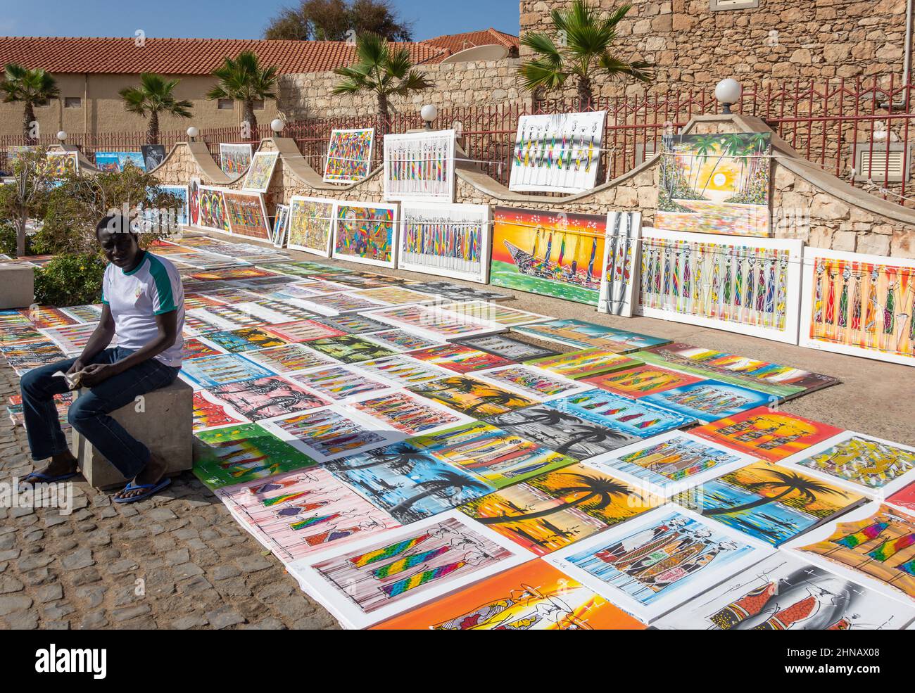 Local paintings for sale on pedestrianised seafront street, Rua Kuamen'Kruma, Santa Maria, Sal, República de Cabo (Cape Verde) Stock Photo