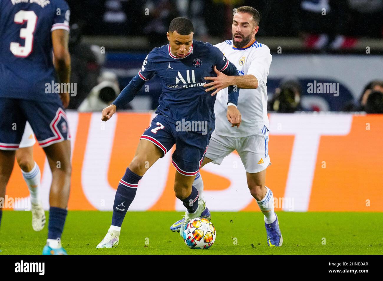 PARIS, FRANCE - FEBRUARY 15: Kylian Mbappe of Paris Saint-Germain battles for the ball with Daniel Carvajal of Real Madrid prior to the Round Of Sixteen Leg One - UEFA Champions League match between Paris Saint-Germain and Real Madrid at Stade de France on February 15, 2022 in Paris, France (Photo by Geert van Erven/Orange Pictures) Stock Photo