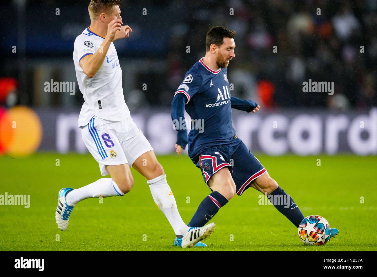 PARIS, FRANCE - FEBRUARY 15: Toni Kroos of Real Madrid battles for the ball with Lionel Messi of Paris Saint-Germain prior to the Round Of Sixteen Leg One - UEFA Champions League match between Paris Saint-Germain and Real Madrid at Stade de France on February 15, 2022 in Paris, France (Photo by Geert van Erven/Orange Pictures) Stock Photo