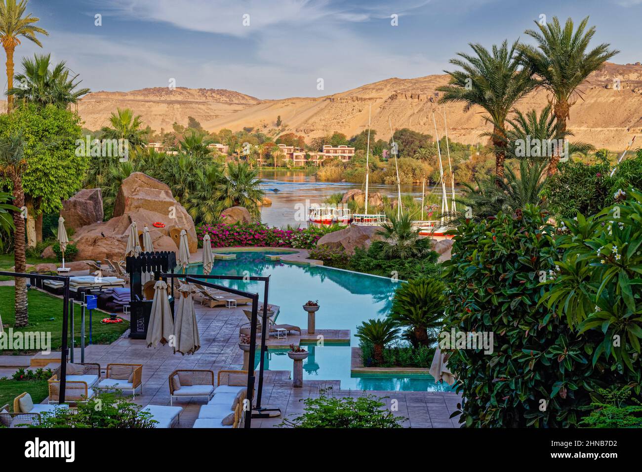 Swimming pool overlooking the River Nile at the Sofitel Legend Old Cataract Hotel in Aswan, Upper Egypt Stock Photo