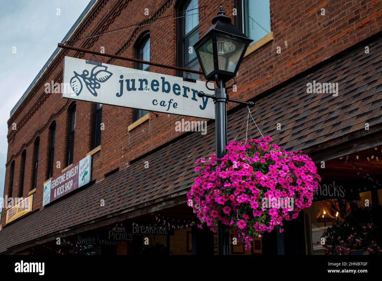 Town of Taylors Falls flower basket hanging on a lamppost at the Juneberry Cafe. Also shops