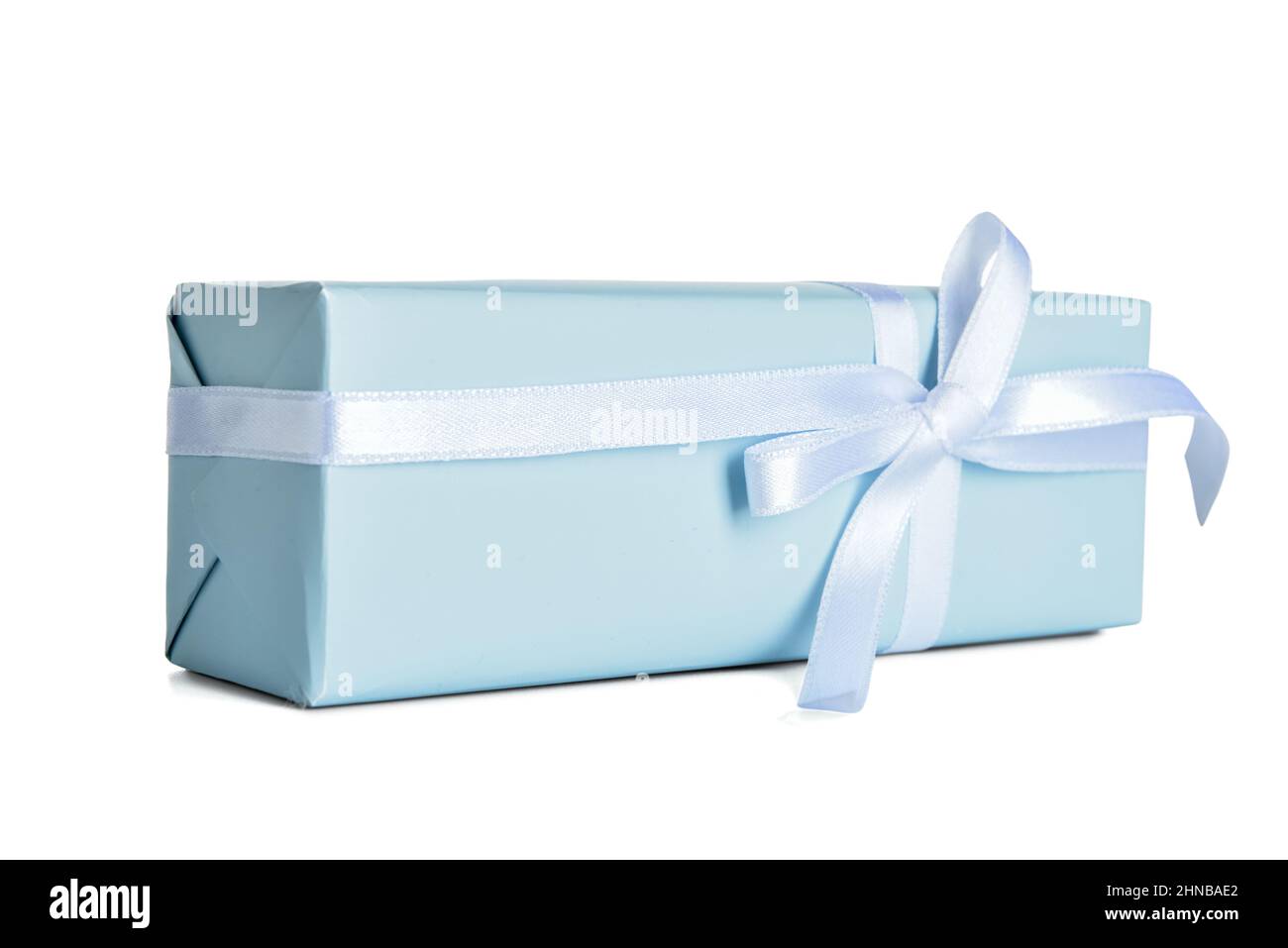 Gift box with ribbon and bow on white background Stock Photo - Alamy