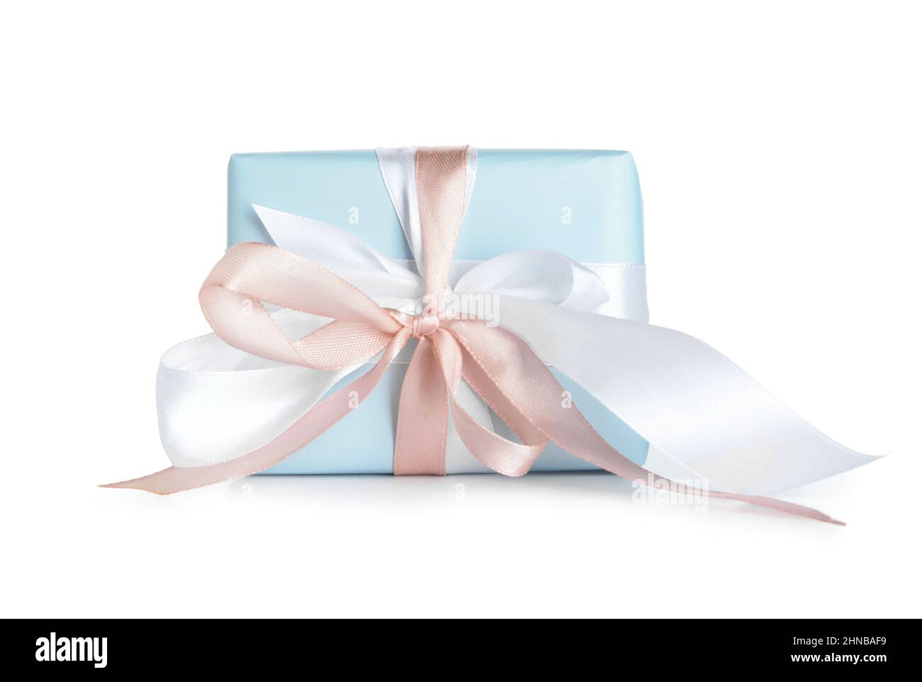 Gift box with ribbons and bow on white background Stock Photo - Alamy