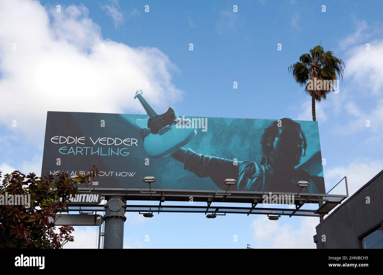 A billboard in Los Angeles announces the release of a new Eddie Vedder album titled Earthling. Stock Photo