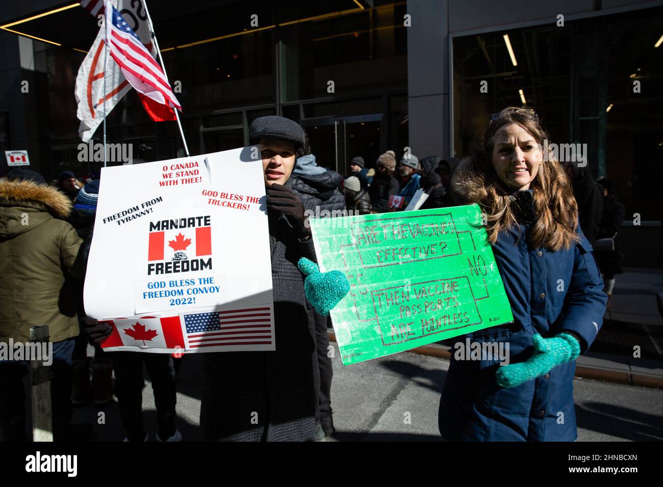 New York, United States. 15th Feb, 2022. Protesters hold anti-mandate signs during the demonstration.Demonstrators gathered at the Canadian Embassy to stand in solidarity with the Canadian truck blockade in Ottawa. Credit: SOPA Images Limited/Alamy Live News Stock Photo