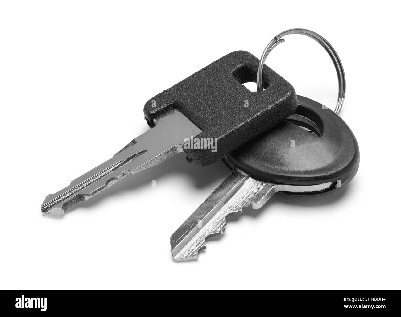 Small Set of Keys Cut Out on White. Stock Photo