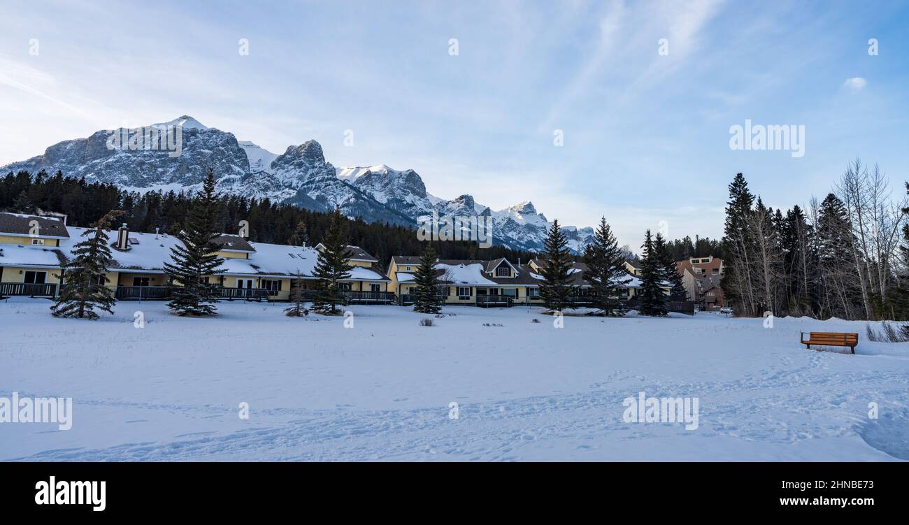 Mt Rundle Canmore West Canmore Park in winter. Row of lodge and snowcapped Canadian ...