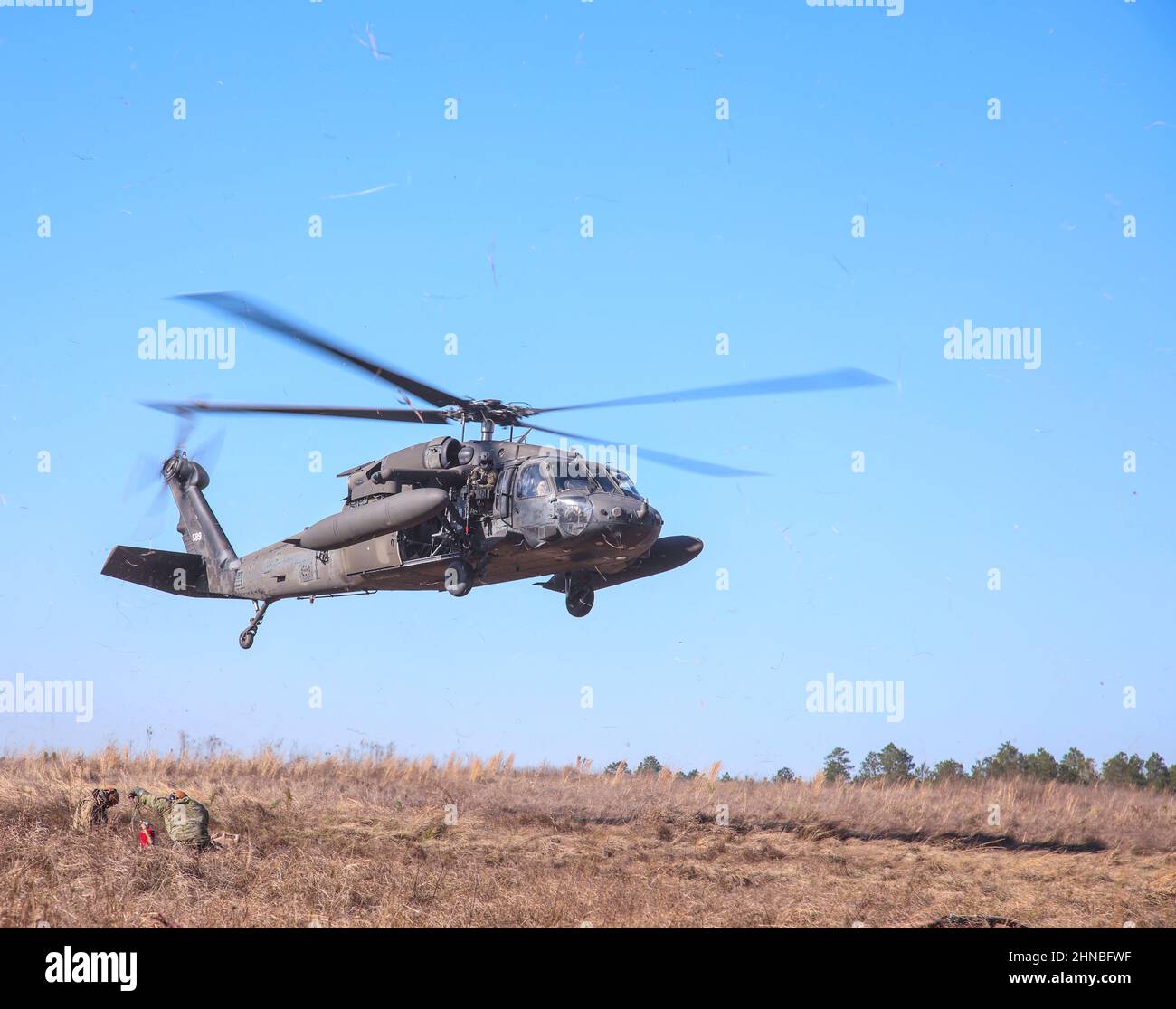 U.S. Army Soldiers assigned to 2-10 AHB a part of TF Six Shooter conduct an air assault INFIL with 1 BCT during JRTC at Fort Polk, La. Jan 23, 2022.(U.S. Army photo by Sgt. Michael Wilson) Stock Photo