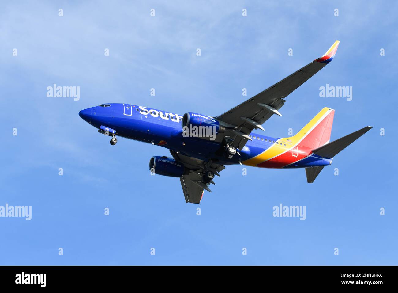 Seatac, WA, USA - February 11, 2022; Boeing 737-700 approaches SeaTac in preparation for landing with wheels down Stock Photo