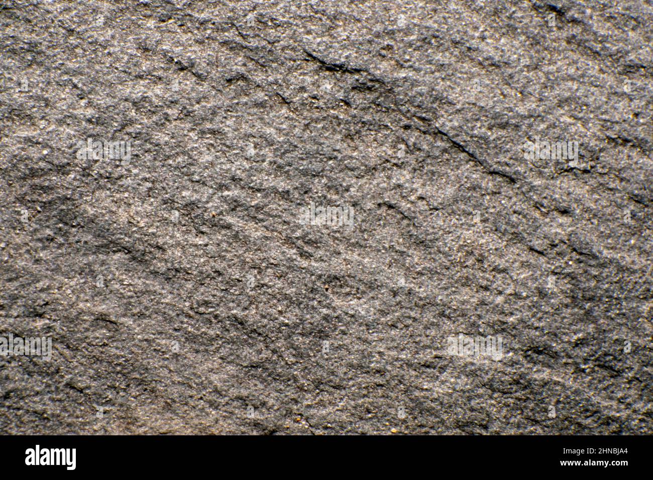 Shale stone close-up. Shale stone is a fine-grained sedimentary rock that is formed when silt and clay are compressed. Stock Photo