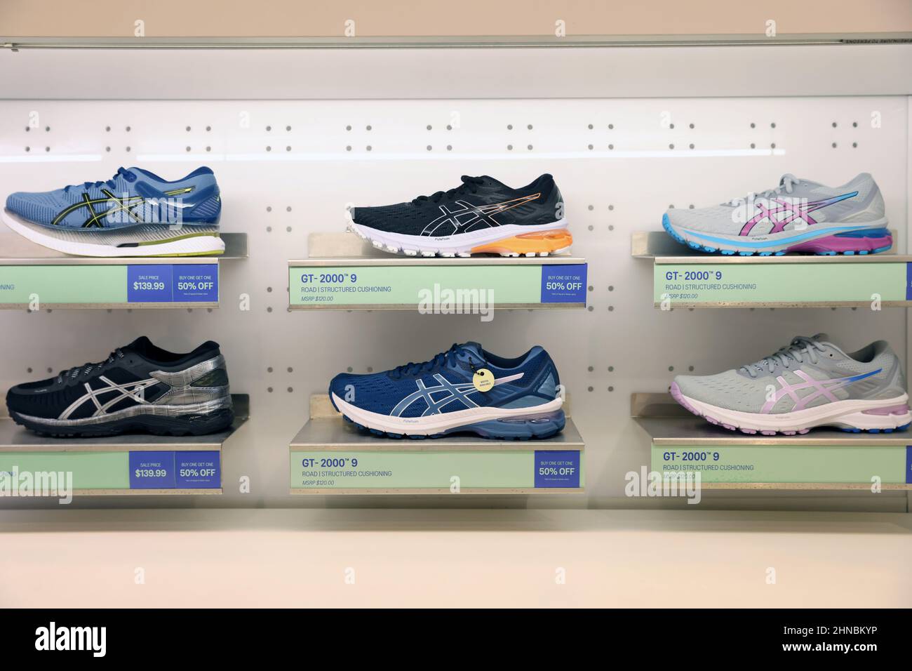 Asics shoes are seen at their store at the Woodbury Common Premium Outlets  in Central Valley, New York, U.S., February 15, 2022. REUTERS/Andrew Kelly  Stock Photo - Alamy