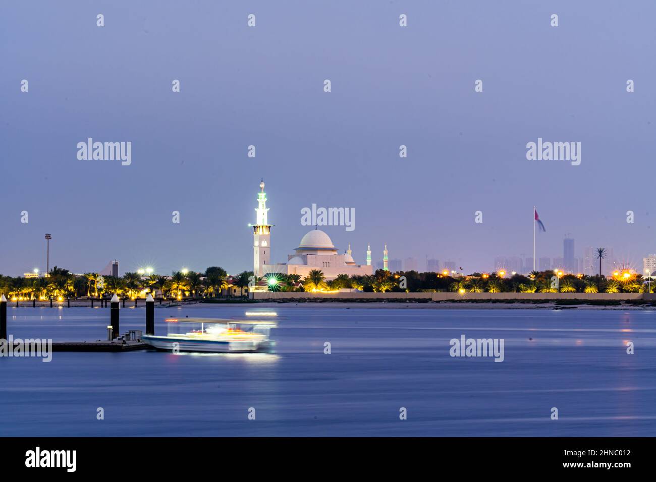 Humaid bin Rashid Al Nuaimi Mosque from Al Zawra Beach in Ajman Stock Photo