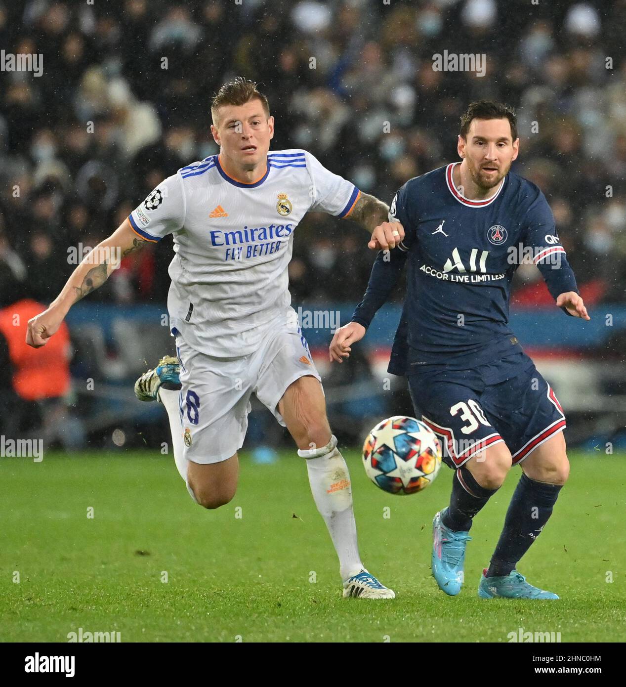 Paris, France, February 15, 2022, PSG’s Lionel Messi and Real Madrid’s Toni Kroos during UEFA Champions League round of 16, leg 1 of 2 Paris Saint-Germain (PSG) v Real Madrid at the Parc des Princes stadium on February 15, 2022 in Paris, France. Photo by Christian Liewig/ABACAPRESS.COM Stock Photo