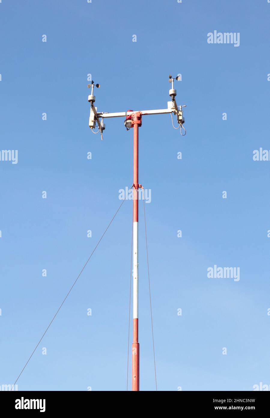 Wind speed sensors against a deep blue sky, measuring wind speed Stock