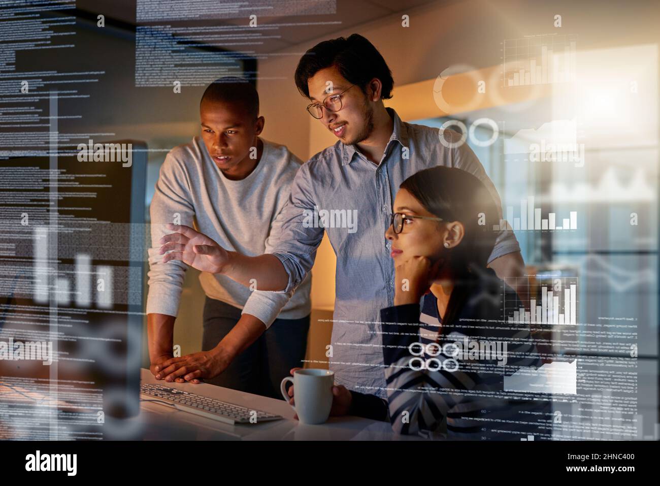 Maybe if we try this code. Shot of computer programmers looking through data in the office. Stock Photo