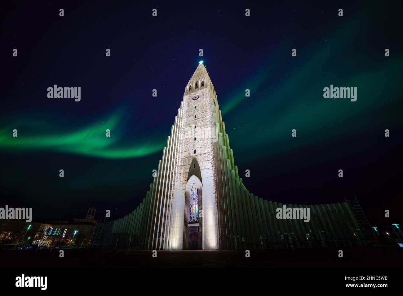Northern lights shining over the church in Reykjavik Iceland Stock Photo