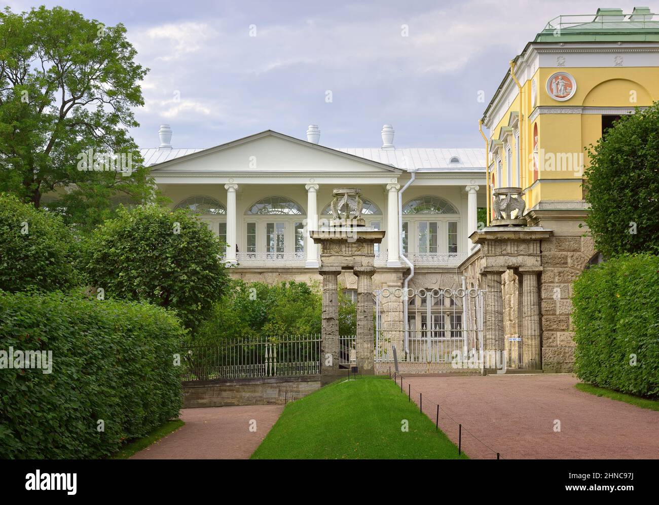 Pushkin/Saint Petersburg / Russia-09.03.2020: Entrance to the Cameron gallery. Doric style gate, white pediment of the ionic order gallery. Monument o Stock Photo