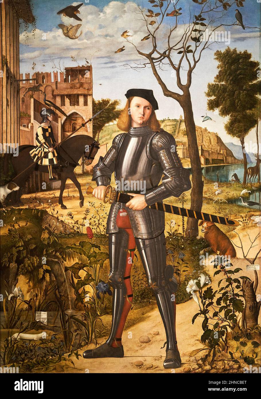 Vittore Carpaccio. Young Knight in a Landscape. ca. 1505.  Oil on canvas. 218.5 x 151.5 cm. The image shows the canvas after the restoration that took Stock Photo