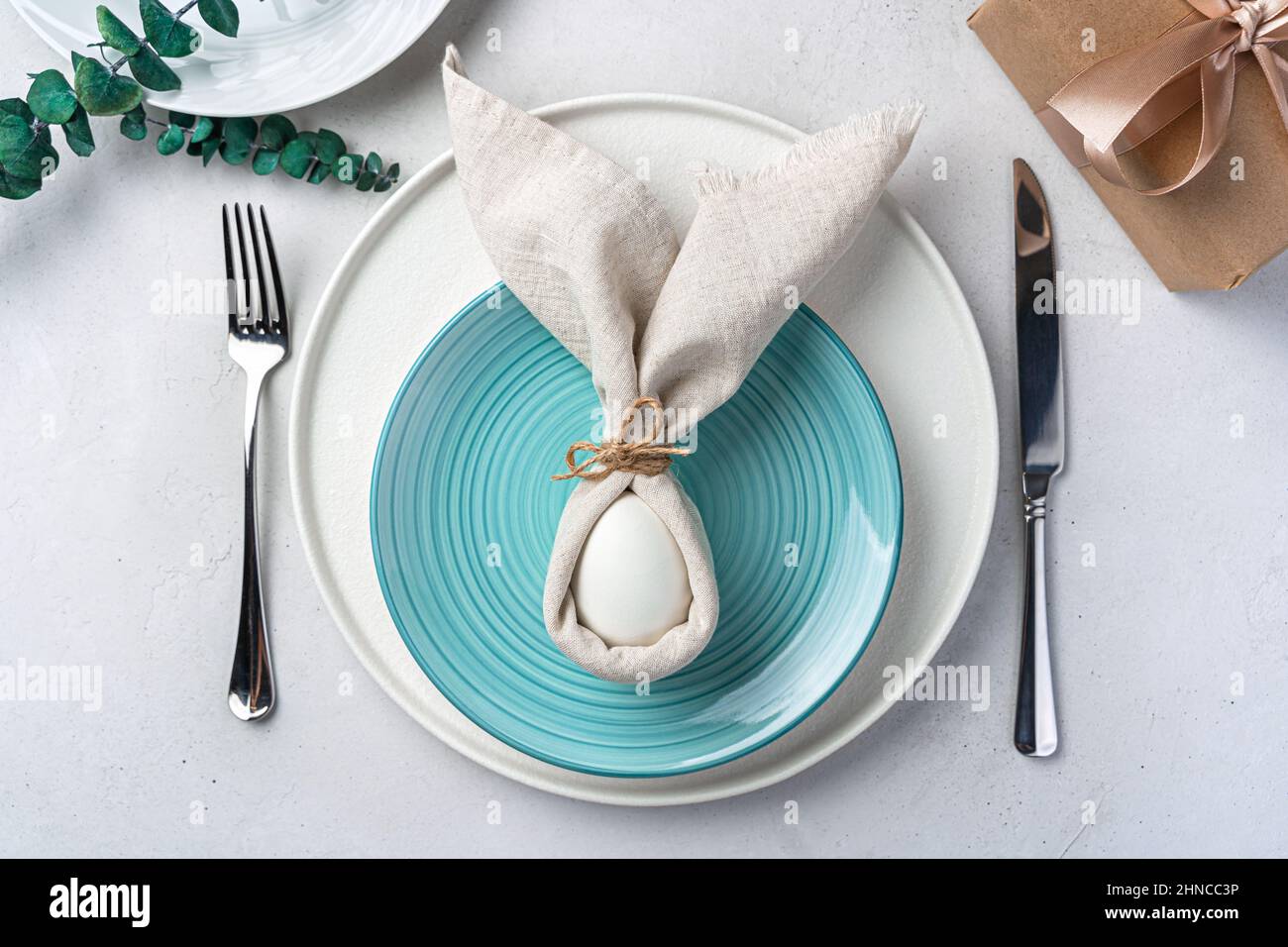 Serving the Easter table. Top view. The concept of a Happy Easter. Stock Photo