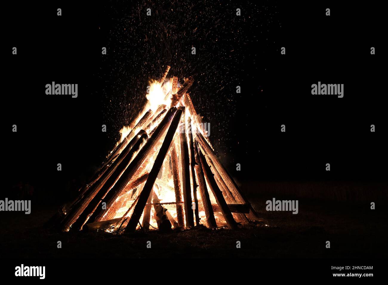 bonfire flying in the pitch black night Stock Photo - Alamy