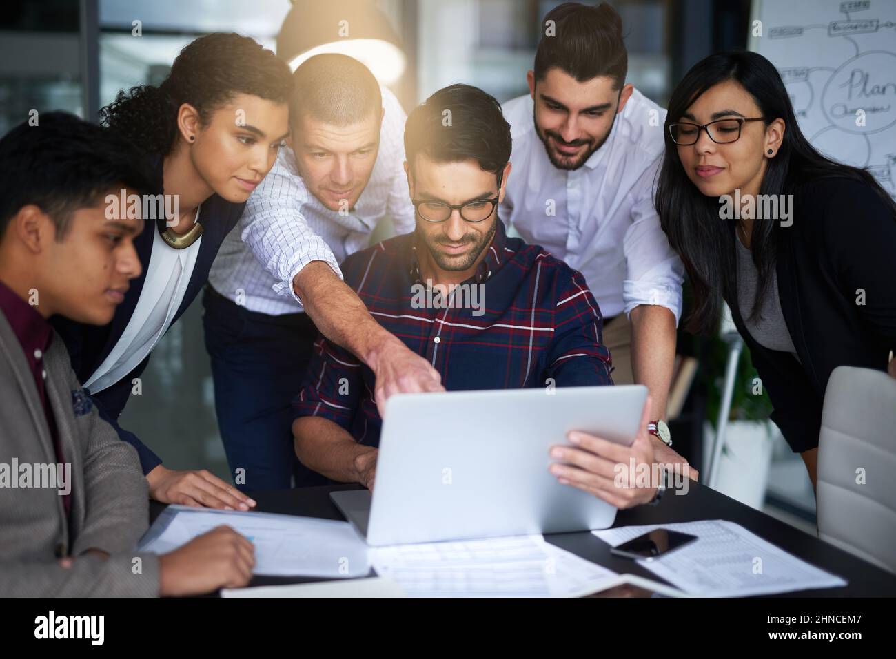 They work seamlessly together. Shot of a group of colleagues working ...