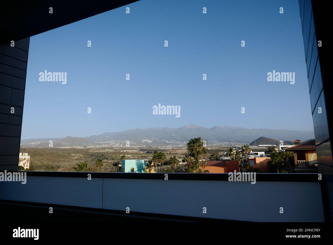 View of Mount Teide from the balcony of a hotel in El Médano, south Tenerife, Canary Islands, Spain, February 2022 Stock Photo