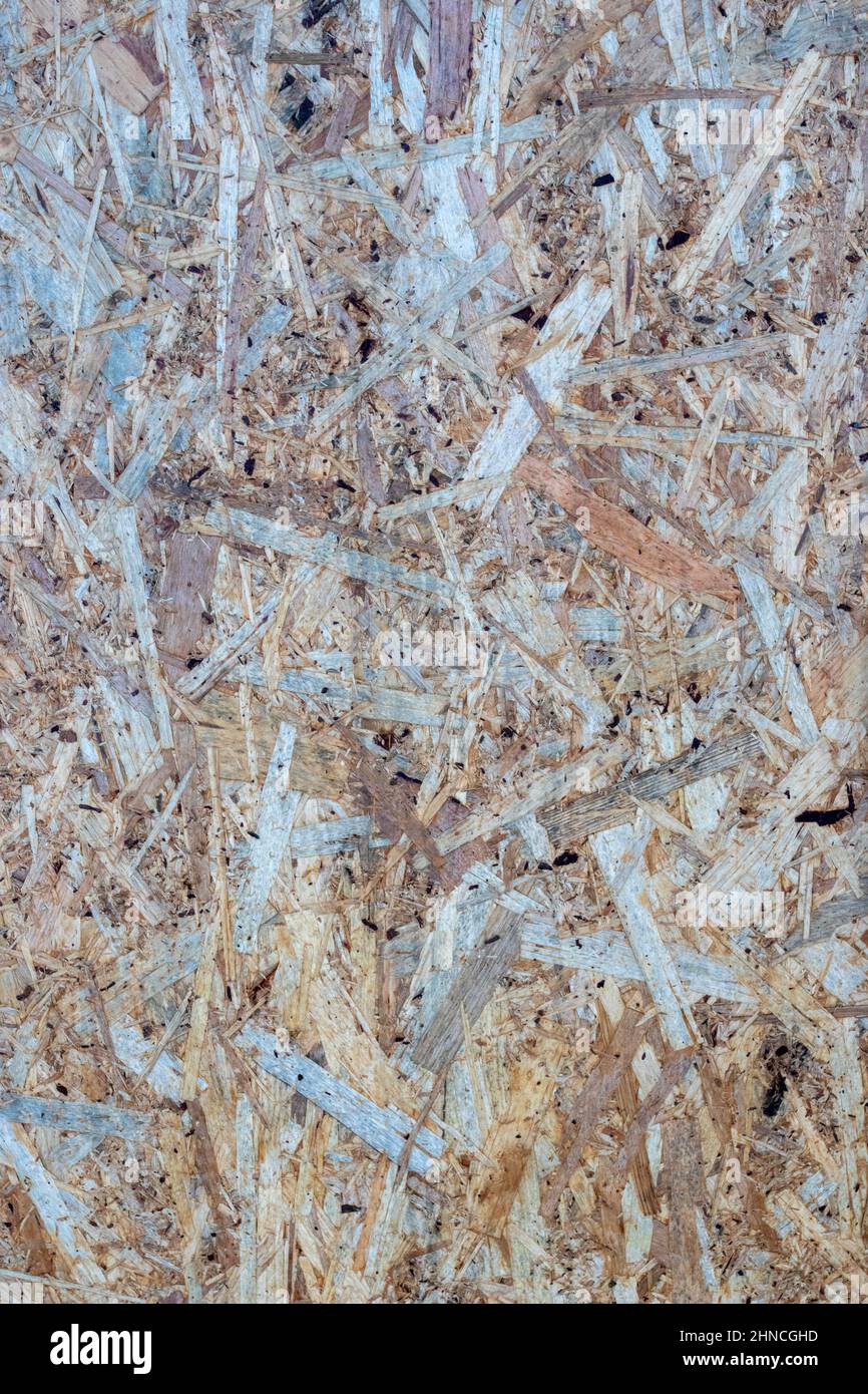 Closeup image showing the colours and texture of chipboard Stock Photo