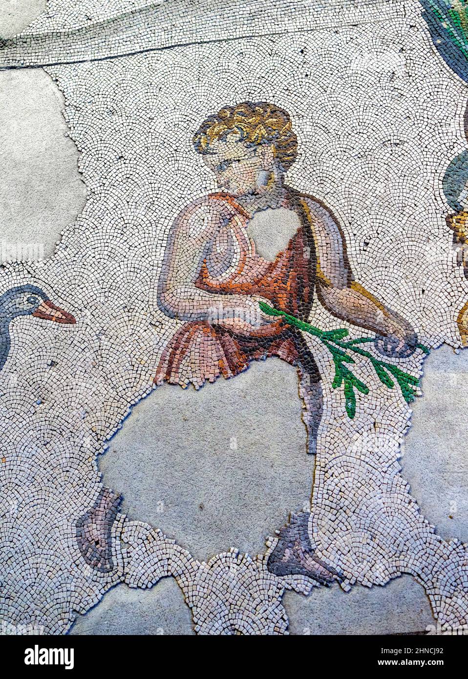 Mosaic work of a girl from the Byzantine period (East Roman period) at Great Palace of Constantinople. 4th-6th century. Great Palace Mosaics Museum. Stock Photo