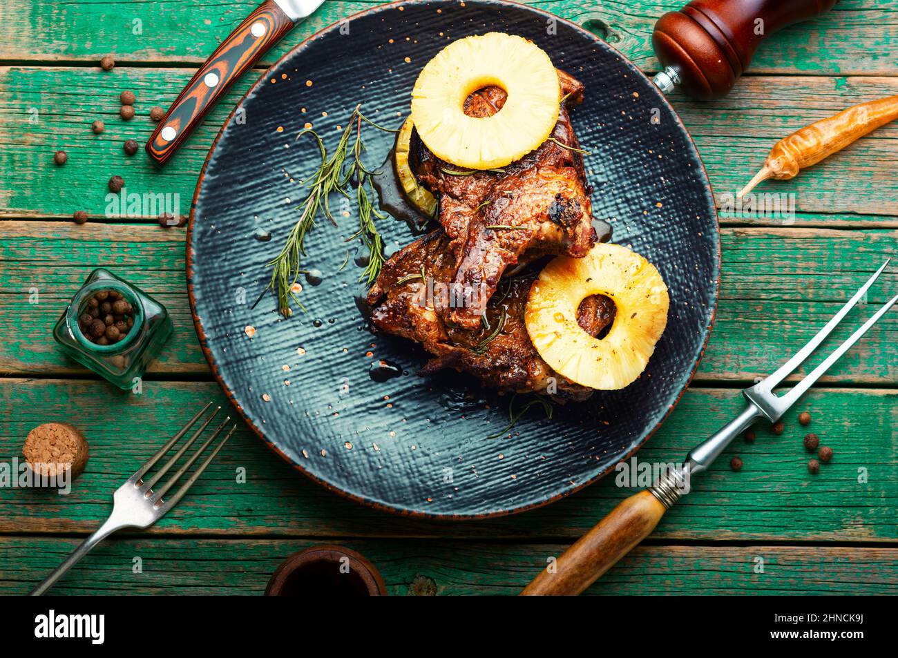 Delicious beef entrecote grilled with pineapple. Top view Stock Photo