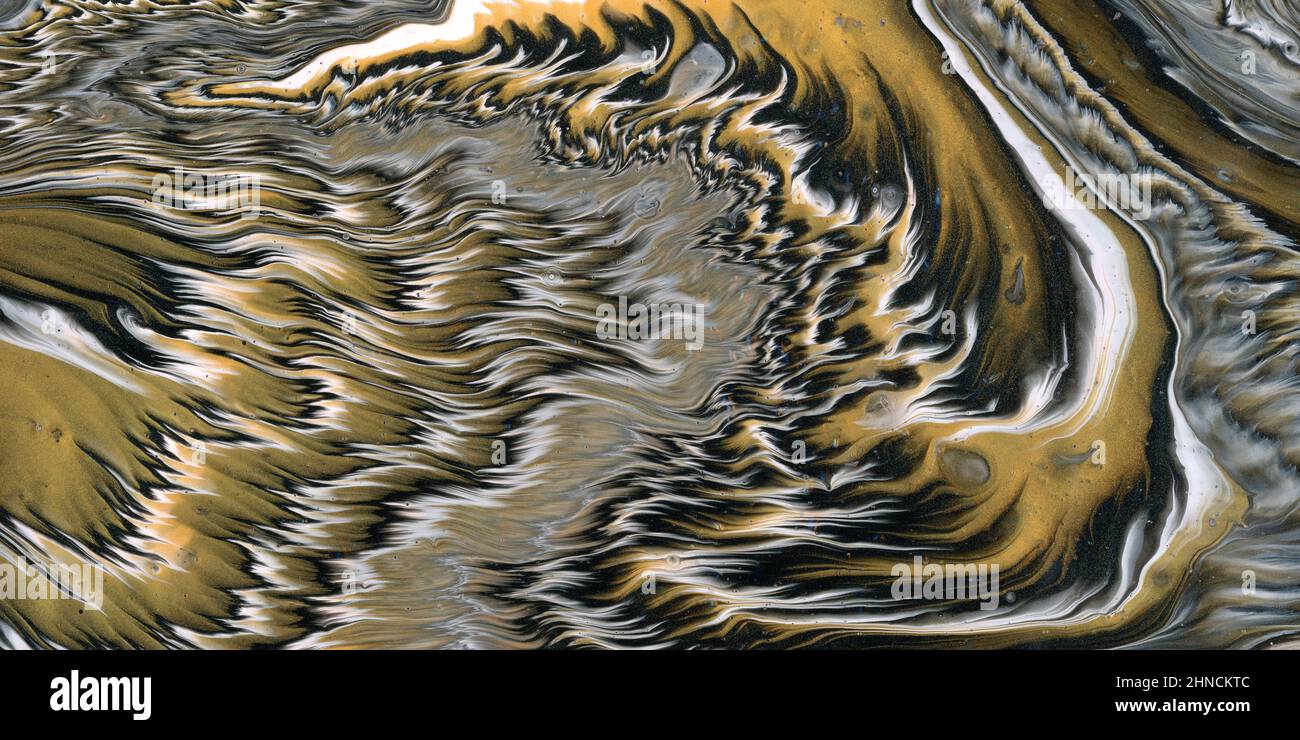 fluid acrylic paint, natural gold and black inks, wave illustration, abstract art, texture or background Stock Photo