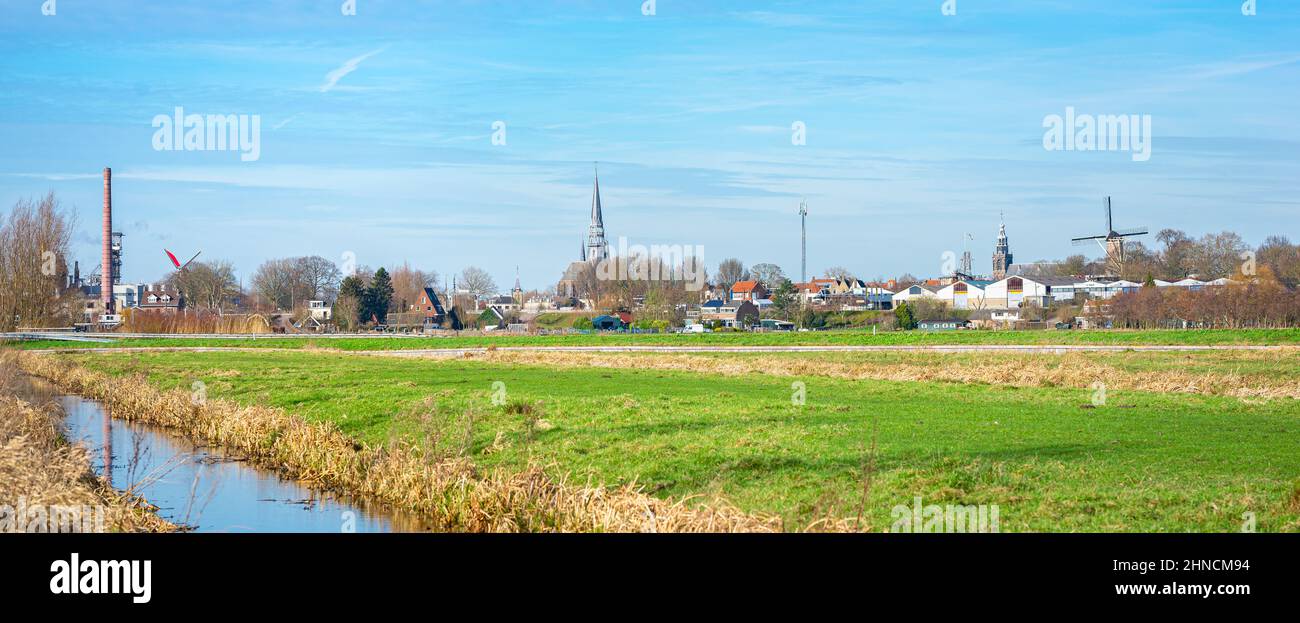 Panoramic view of a classic polder landscape and the historic city of Gouda in the western part of the Holland Stock Photo
