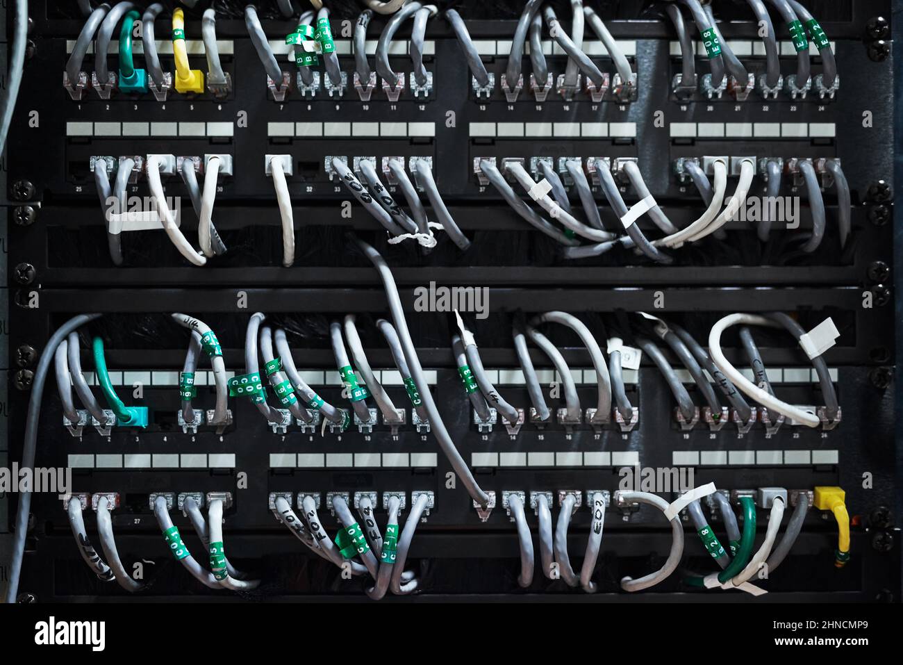 Complicated yet efficient. Cropped shot of the inside of a computer with all of its wiring located in a server room. Stock Photo