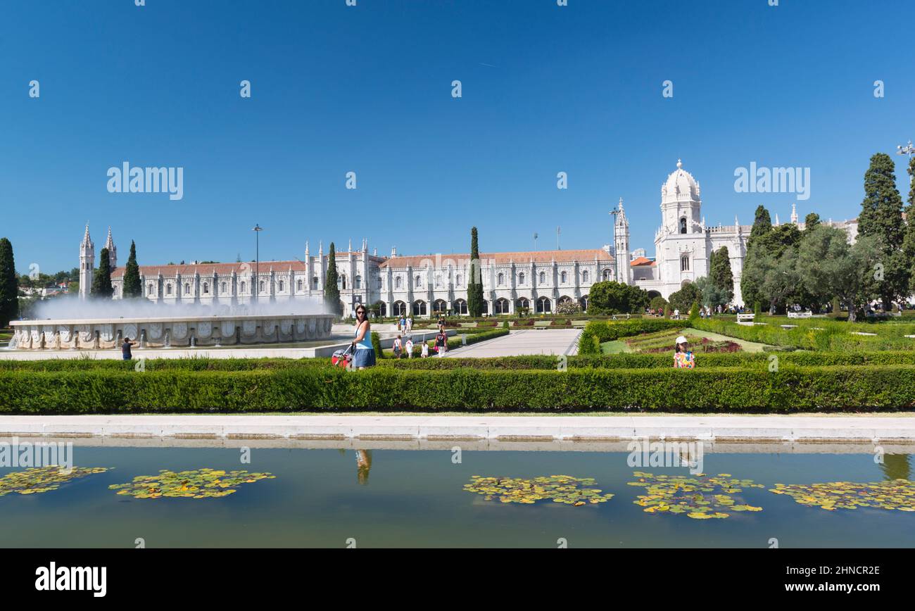 Water lilies, fountain and the Jerónimos Monastery in Lisbon, Portugal. Stock Photo