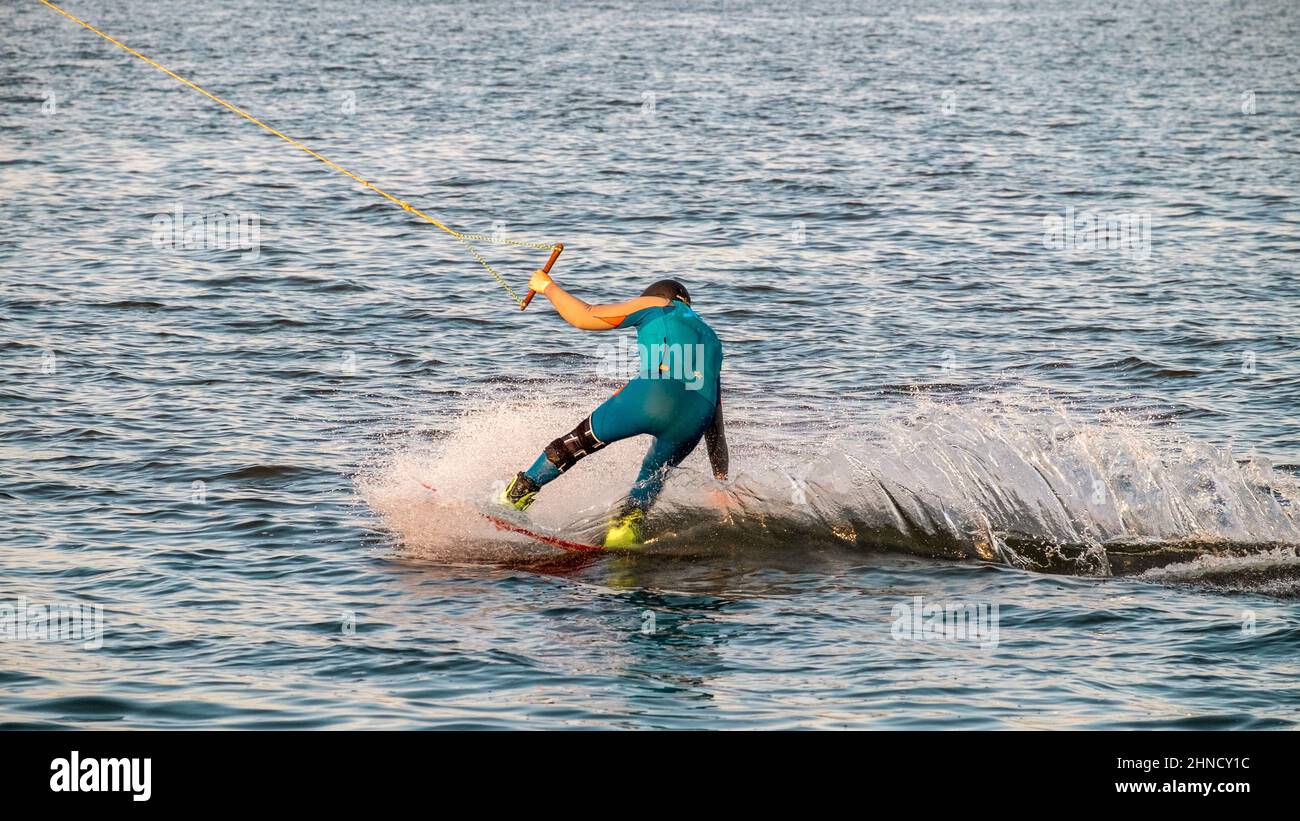 High-speed wakeboarding on the water Stock Photo