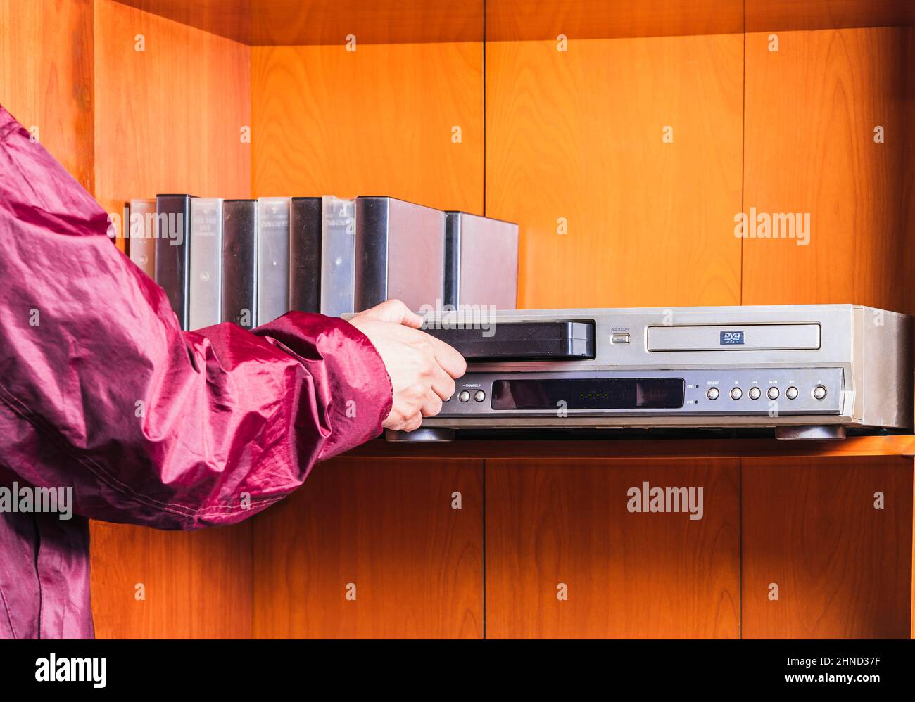 Person Putting A Vhs Tape Into The Player Wearing A Retro 90 S Jacket Stock Photo Alamy Person Putting A Vhs Tape Into The Player Wearing A Retro 90 S Jacket Stock Photo Alamy