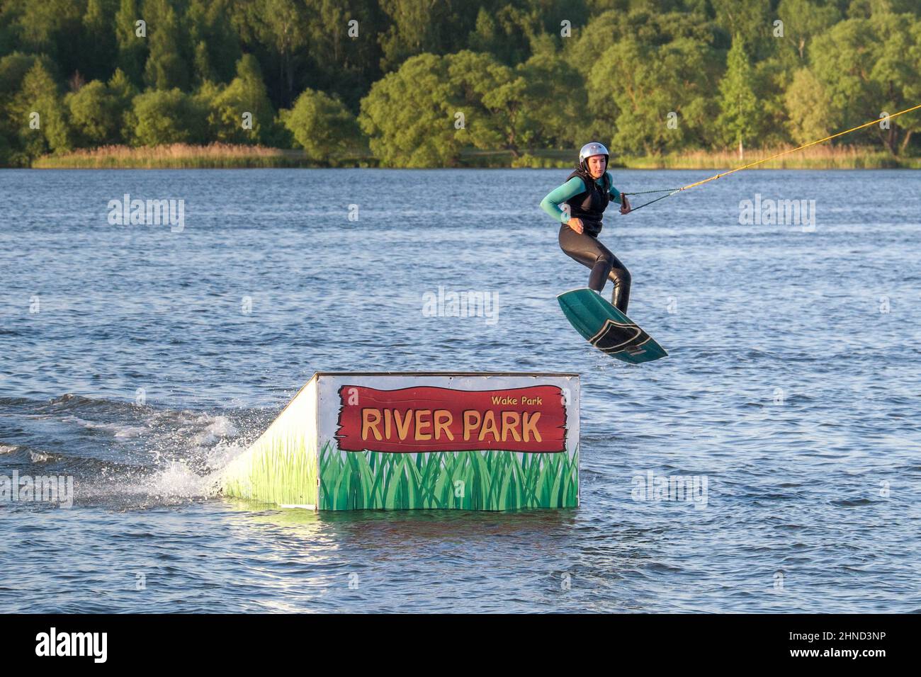 wakeboarding on the water. entertainment on a day off in the park on the water. water jumping Stock Photo