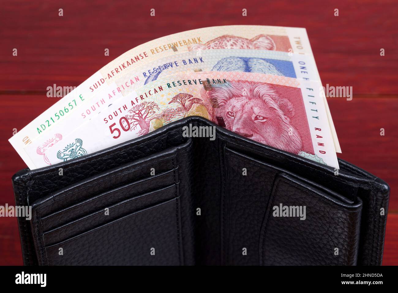 Old South African money- Rand in the black wallet Stock Photo