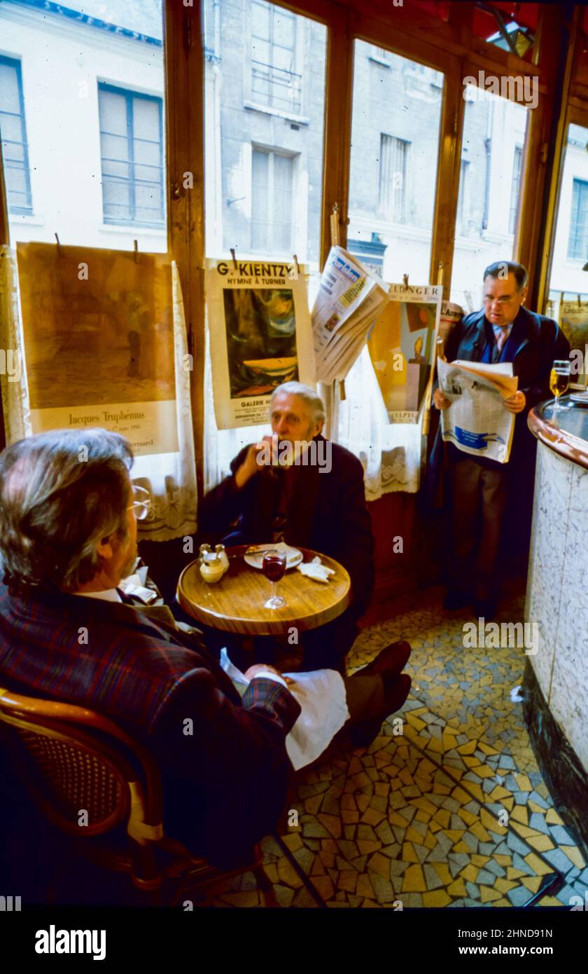 Paris, France, inside Senior Men sharing Drinks, Old French Bistro