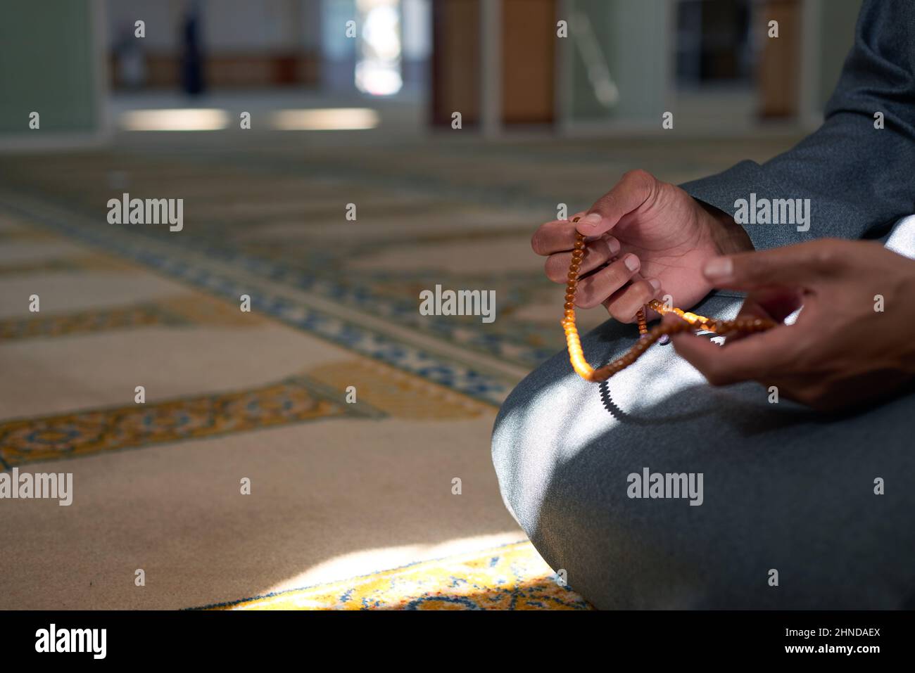 Kneeling with prayer hands hi-res stock photography and images - Alamy