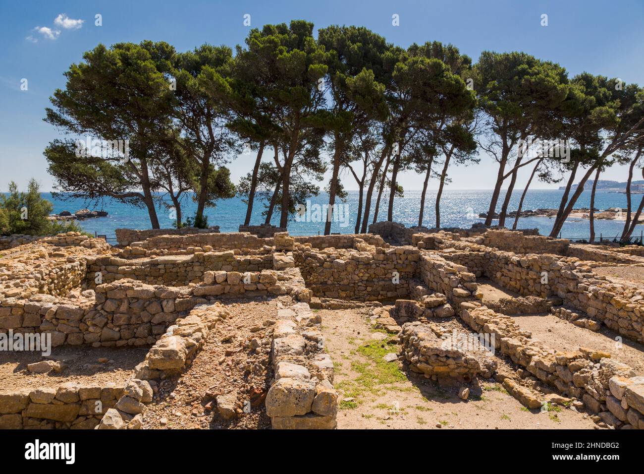 Empuries also known as Ampurias, Girona Province, Catalonia, Spain. City walls in the southern sector dating from the 2nd century BC.  Empuries was fo Stock Photo
