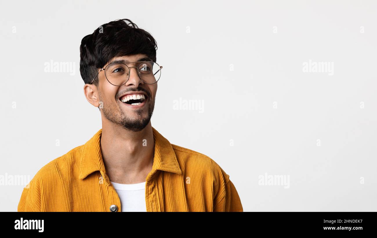 Handsome young indian man looking at copy space Stock Photo