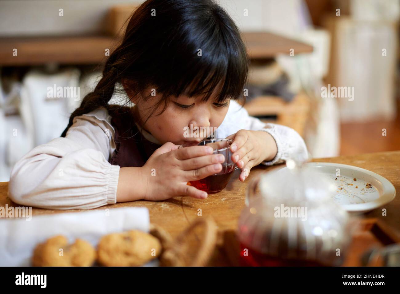 Japanese kid drinking tea hires stock photography and images Alamy