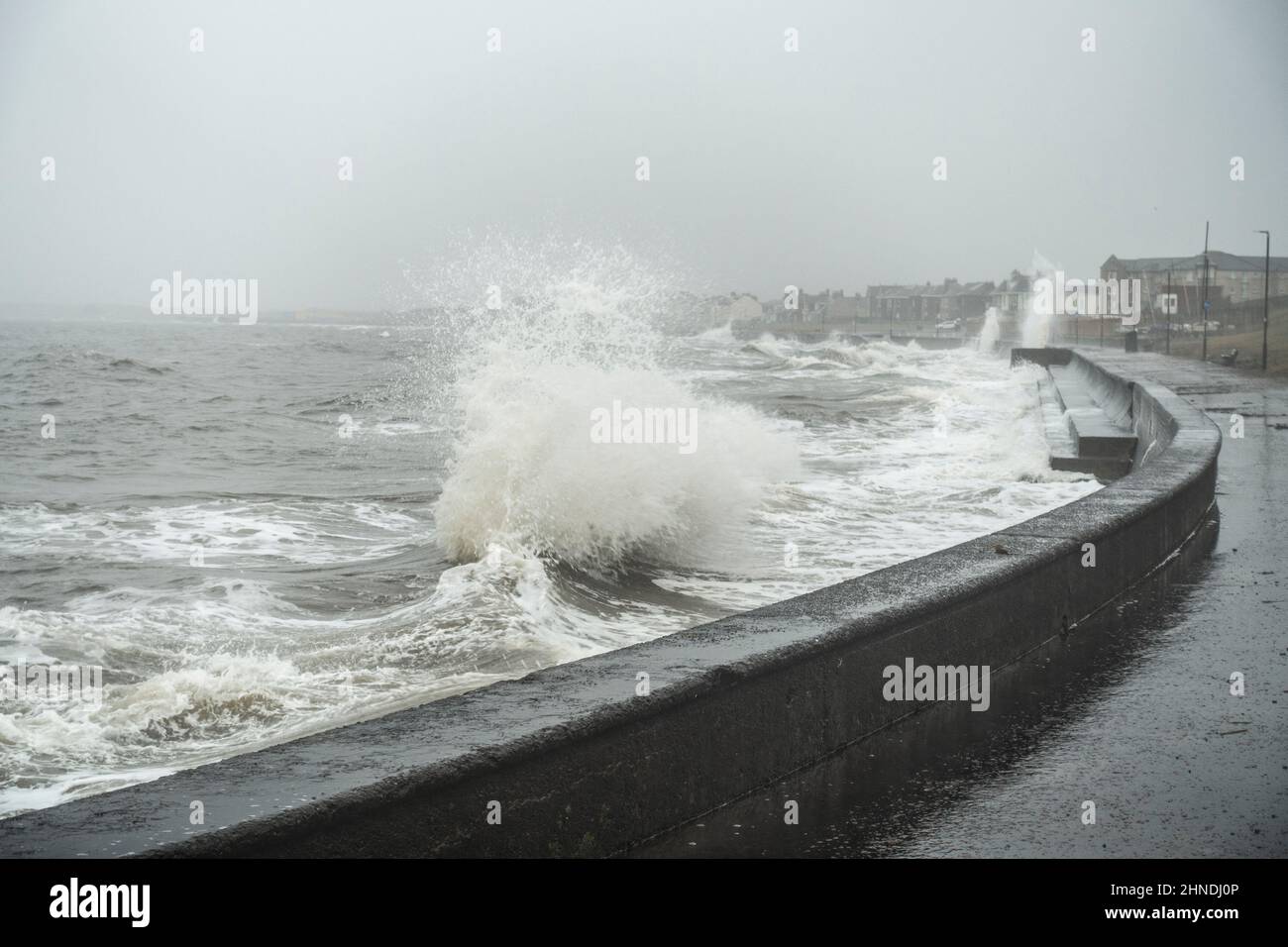 Prestwick, Scotland, UK; 16th February 2022. A High Tide ahead of Storm Dudley brings waves crashing up onto the Promenade at Prestwick Seafront, South Ayrshire.   Liz Leyden/Alamy Live News Stock Photo