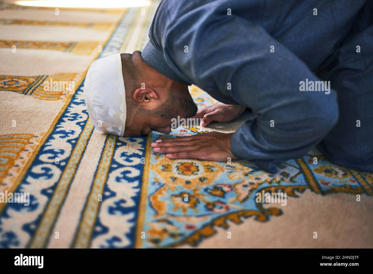 A close up of a Muslim man prostrate in prayer Stock Photo Alamy